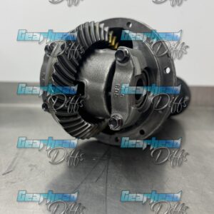 A metal automotive differential with exposed gears, often called "diffs," sits on a stainless steel surface. The image is watermarked multiple times with the text "Gearhead Diffs" in blue and grey.