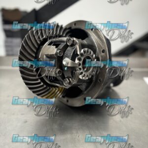 Close-up of a 70 Series Toyota NEW TERRAIN TAMER 3.9 Ratio UPGRADED Rebuilt LSD Exchange Diff on a metal workbench, showing gears and mechanical components with "Gearhead Diffs" watermarks visible.