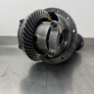 A detailed close-up of the Import placeholder for 1961 shows its metal mechanical gear assembly, with visible gear teeth and bolts, resting on a metal surface against a plain background.